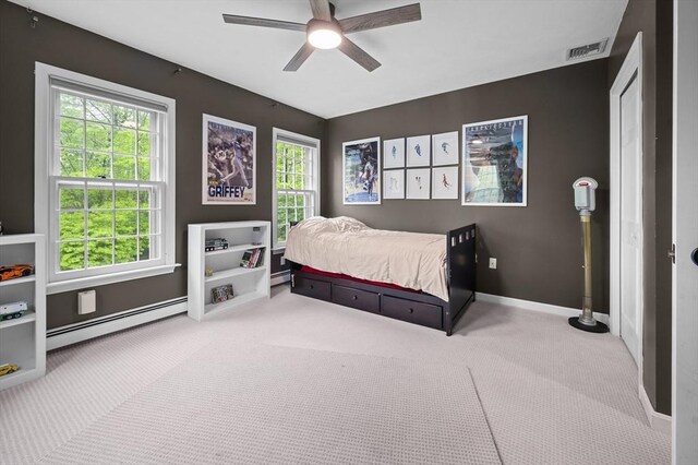 126 Arrow Head Rd, Marshfield, MA 02050 - carpeted bedroom with baseboard heating, baseboards, and ceiling fan