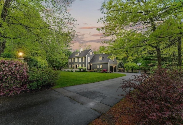 126 Arrow Head Rd, Marshfield, MA 02050 - colonial inspired home with a chimney, a yard, and asphalt driveway