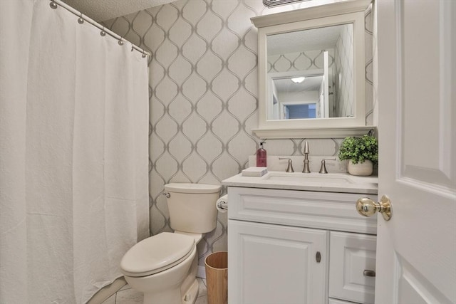181 Littleton Rd Unit 213, Chelmsford, MA 01824 - full bathroom with wallpapered walls, a textured ceiling, vanity, toilet, and a shower with shower curtain