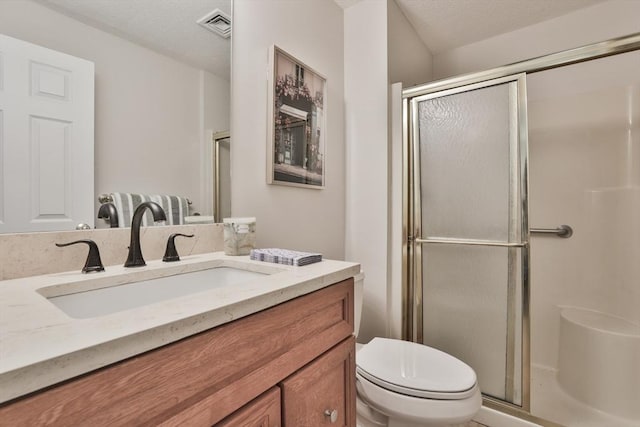 181 Littleton Rd Unit 213, Chelmsford, MA 01824 - bathroom with a shower stall, vanity, and toilet