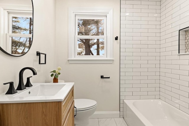 full bathroom with toilet, bathing tub / shower combination, vanity, baseboards, and marble finish floor