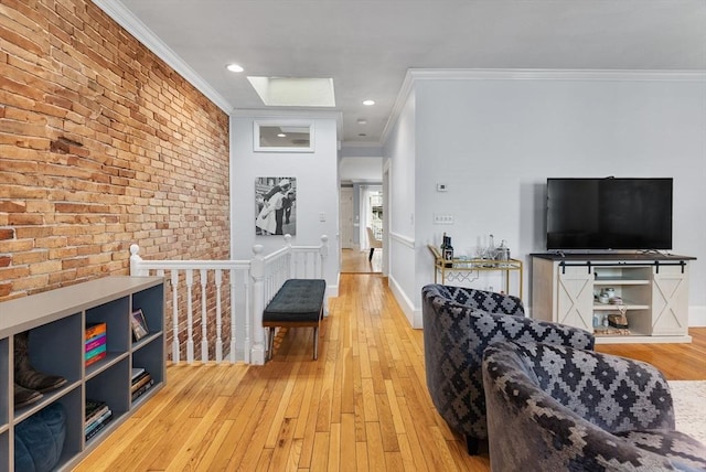 9-11 Linley Ter Unit 2, Boston, MA 02127 - living room featuring ornamental molding, brick wall, light wood-style flooring, baseboards, and recessed lighting