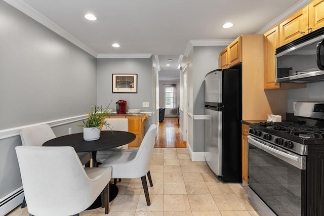 9-11 Linley Ter Unit 2, Boston, MA 02127 - kitchen featuring appliances with stainless steel finishes, a baseboard radiator, ornamental molding, recessed lighting, and baseboards