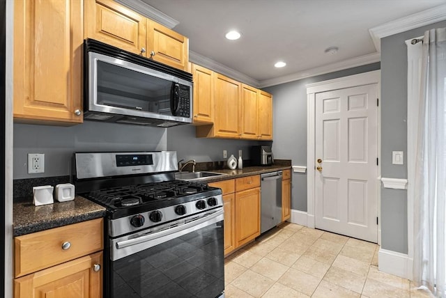 9-11 Linley Ter Unit 2, Boston, MA 02127 - kitchen featuring stainless steel appliances, a sink, dark countertops, ornamental molding, and baseboards