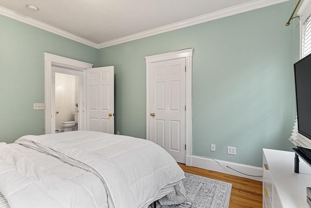 9-11 Linley Ter Unit 2, Boston, MA 02127 - bedroom featuring ornamental molding, wood finished floors, and baseboards