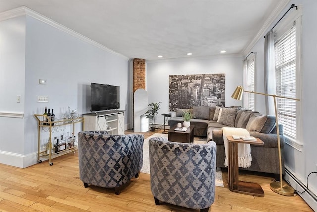 9-11 Linley Ter Unit 2, Boston, MA 02127 - living area with a baseboard heating unit, light wood-type flooring, ornamental molding, baseboards, and recessed lighting
