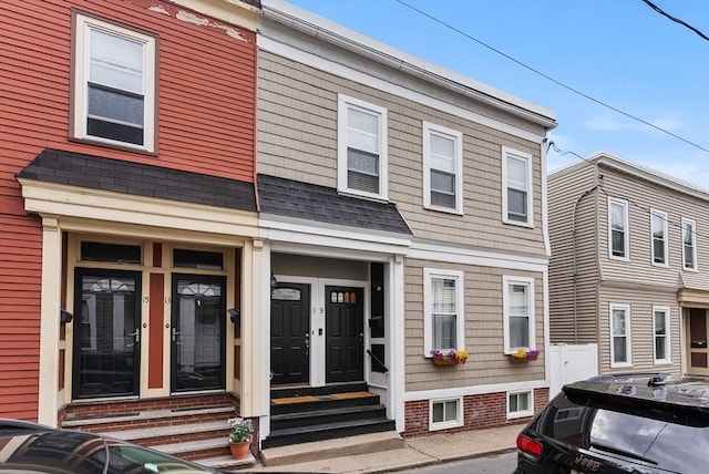 9-11 Linley Ter Unit 2, Boston, MA 02127 - view of property with entry steps and a shingled roof