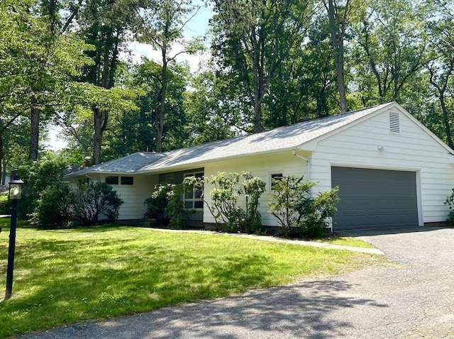 216 Bel Air Dr, Longmeadow, MA 01106 - single story home with a front yard, driveway, and a garage