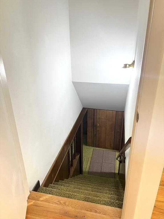 216 Bel Air Dr, Longmeadow, MA 01106 - staircase featuring wood finished floors