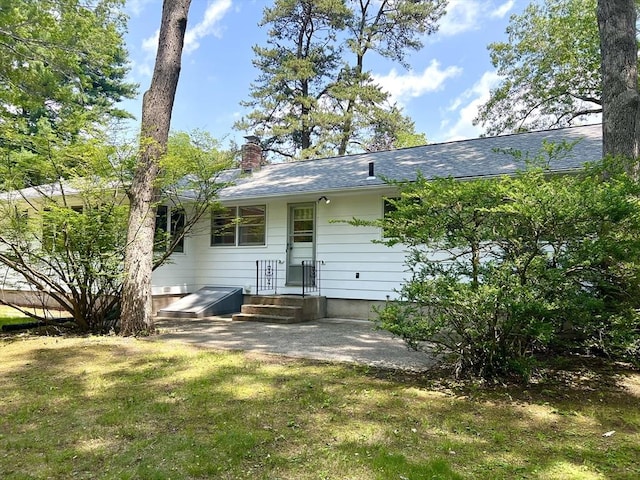 216 Bel Air Dr, Longmeadow, MA 01106 - back of house featuring a chimney and a lawn