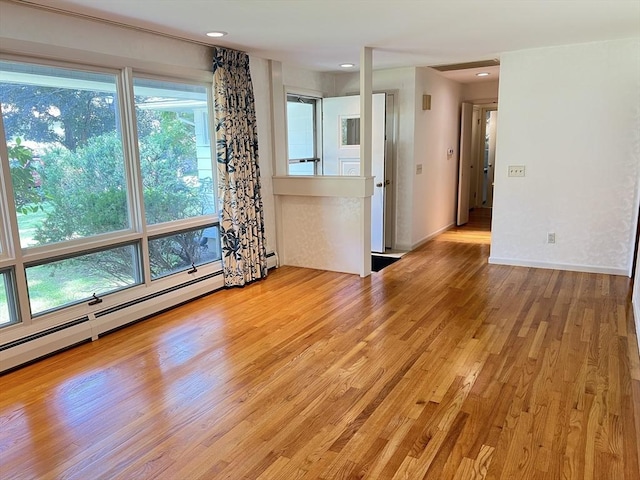 216 Bel Air Dr, Longmeadow, MA 01106 - spare room featuring light wood-type flooring, plenty of natural light, baseboard heating, and recessed lighting