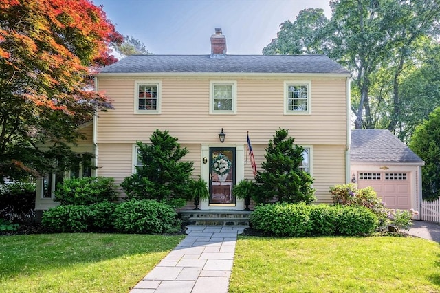 9 Mohawk Rd, Marblehead, MA 01945 - colonial house with a chimney and a front lawn