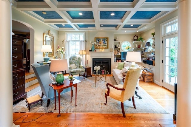 9 Mohawk Rd, Marblehead, MA 01945 - living area featuring coffered ceiling, wood finished floors, beam ceiling, recessed lighting, and arched walkways