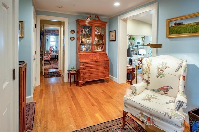 9 Mohawk Rd, Marblehead, MA 01945 - living area with light wood-style floors, crown molding, and recessed lighting