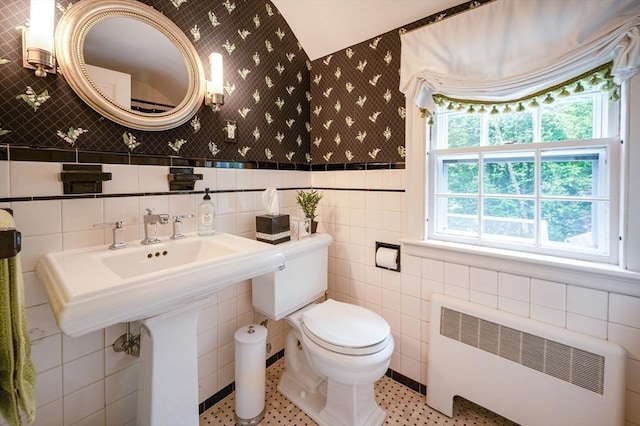 9 Mohawk Rd, Marblehead, MA 01945 - half bathroom featuring radiator, tile walls, and tile patterned flooring