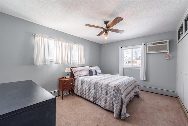 carpeted bedroom with a wall mounted air conditioner, a baseboard radiator, ceiling fan, a textured ceiling, and a closet