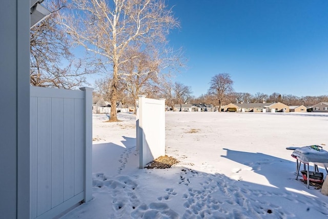 view of yard covered in snow