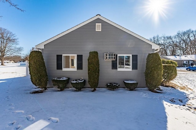 view of snow covered property