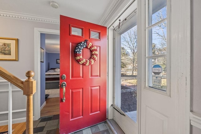 entryway featuring dark wood-style floors and stairway