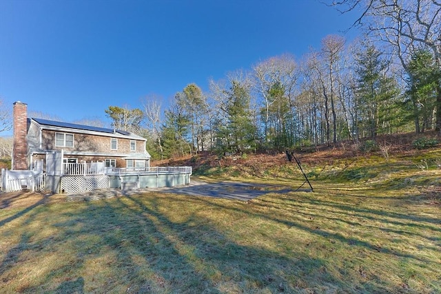 view of yard with a deck