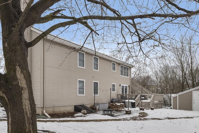 15 Bunker St Unit 2, Boston, MA 02136 - snow covered back of property with a deck