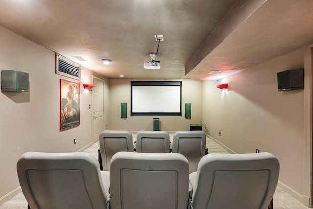 home theater room featuring light hardwood / wood-style flooring