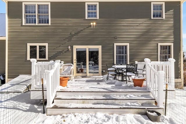 view of snow covered property