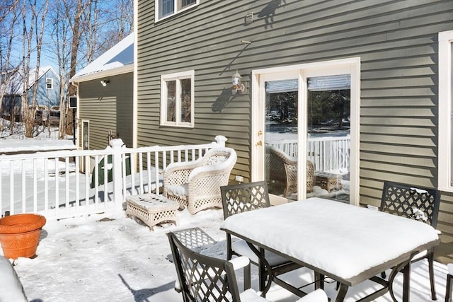 view of snow covered patio