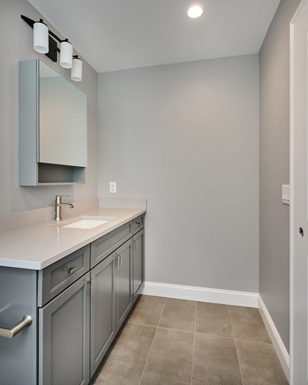 bathroom featuring vanity and tile patterned floors