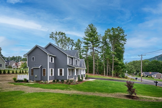 view of property exterior with a yard