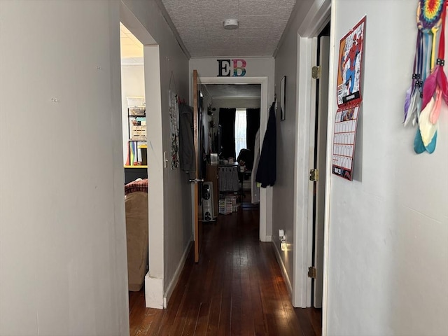 corridor featuring hardwood / wood-style flooring