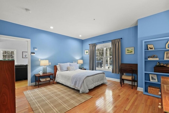 bedroom with light wood-type flooring