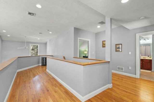 kitchen featuring sink and light wood-type flooring