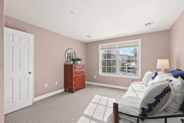 living area with light carpet