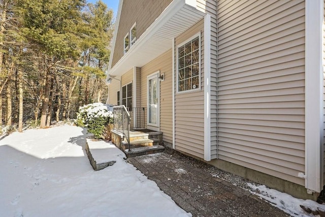 view of snow covered property