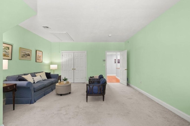 living room featuring light colored carpet