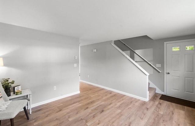 742 Daniel Shays Hwy Unit 1F, Athol, MA 01331 - entryway with stairs and light wood finished floors
