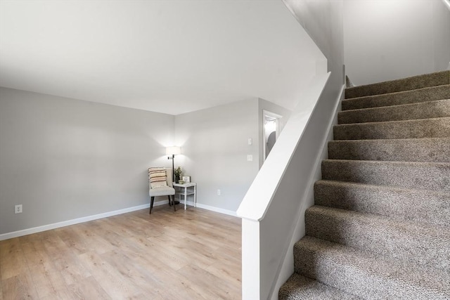 742 Daniel Shays Hwy Unit 1F, Athol, MA 01331 - stairway with wood finished floors