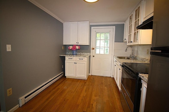 17 Fairland St Unit 17, Boston, MA 02119 - kitchen featuring black / electric stove, a baseboard heating unit, a sink, crown molding, and dark wood-style flooring