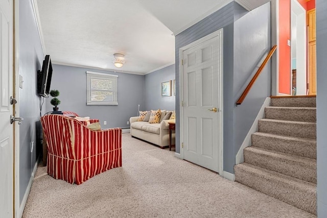 living room with ornamental molding, carpet floors, baseboards, and stairway