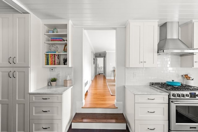 56 Postgate Rd, Hamilton, MA 01982 - kitchen with stainless steel range with gas cooktop, wall chimney range hood, crown molding, decorative backsplash, and open shelves