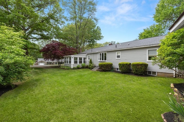 56 Postgate Rd, Hamilton, MA 01982 - view of grassy yard featuring a sunroom