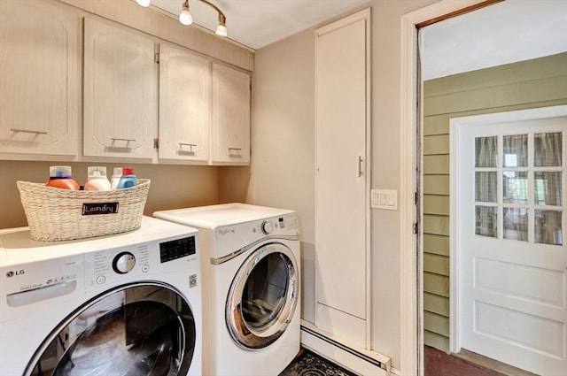 10 Emile Cir, Malden, MA 02148 - washroom with a baseboard heating unit, washer and clothes dryer, and cabinet space