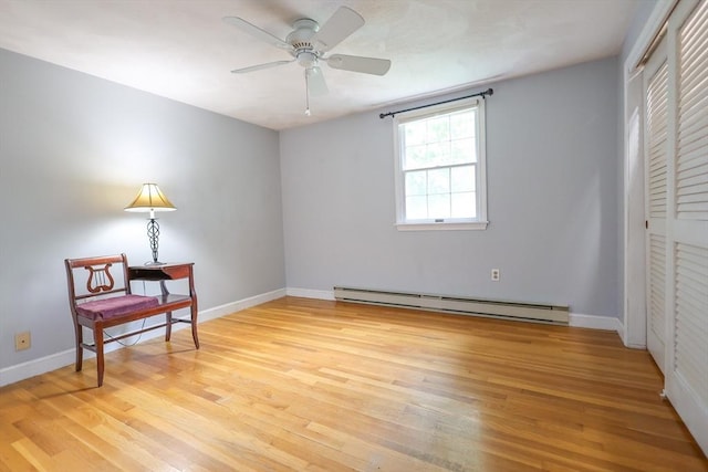 10 Emile Cir, Malden, MA 02148 - unfurnished bedroom featuring a baseboard radiator, light wood-type flooring, a closet, baseboards, and a ceiling fan
