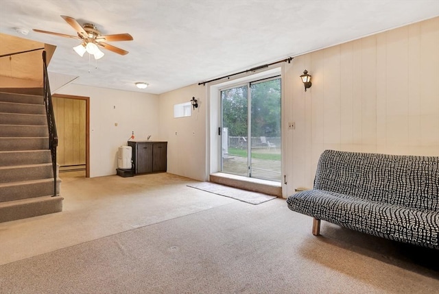 10 Emile Cir, Malden, MA 02148 - living area featuring carpet floors, ceiling fan, stairway, and baseboard heating
