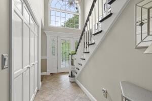 5 Lancaster Ln, Bourne, MA 02532 - foyer entrance with stairs and a chandelier