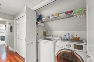 5 Lancaster Ln, Bourne, MA 02532 - laundry room featuring washer and clothes dryer and wood finished floors