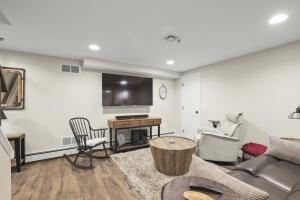 5 Lancaster Ln, Bourne, MA 02532 - living room with wood finished floors and recessed lighting