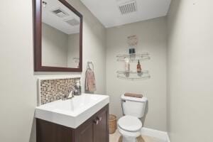 5 Lancaster Ln, Bourne, MA 02532 - bathroom with vanity and tasteful backsplash
