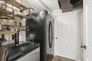 5 Lancaster Ln, Bourne, MA 02532 - kitchen featuring freestanding refrigerator and open shelves